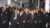 Sadiq Khan gathers with current students during a 2011 visit to his school in London's ethnically diverse Tooting neighborhood. (Photo courtesy of Ernest Bevin College)
