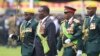 FILE: UMongameli Emmerson Mangagwa loRetired General Constantino Chiwenga bahlola ibutho eZimbabwe ngosuku lokunanza uzibuse. (AP Photo/Tsvangirayi Mukwazhi)