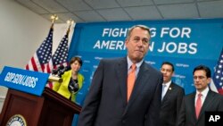 Ketua DPR AS John Boehner dalam jumpa pers bulan lalu mengenai undang-undang layanan kesehatan yang dikenal sebagai Affordable Care Act. (AP/J. Scott Applewhite)