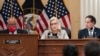 FILE - Rep. Liz Cheney, vice chair of the House panel investigating the Jan. 6 U.S. Capitol insurrection, is flanked by the panel's chairman, Rep. Bennie Thompson, and Rep. Jamie Raskin during a session of the panel at the Capitol in Washington, Dec. 13, 2021.