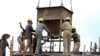 Laborers work at a railway station construction site in Ethiopia's capital Addis Ababa, Sept. 16, 2013.