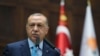 Le président turc Tayyip Erdogan lors d'une réunion au parlement à Ankara, en Turquie, le 24 juillet 2018.