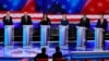 Democratic presidential hopefuls, from left, Marianne Williamson, John Hickenlooper, Andrew Yang, Pete Buttigieg, Joseph R. Biden, Bernie Sanders, Kamala Harris, Kirsten Gillibrand, Michael Bennet, and Eric Swalwell in Miami, June 27, 2019.