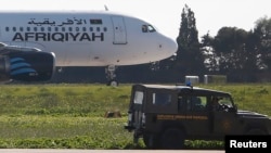 L'appareil d'Afriqiyah Airways sur le tarmac de l’aéroport de La Valette, Malte, le 23 décembre 2016