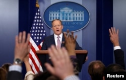 FILE - White House spokesman Sean Spicer holds a press briefing at the White House in Washington, D.C., Jan. 23, 2017.