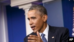 Pour Barack Obama, le piratage était plutôt du cybervandalisme (AP)