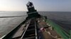 FILE - An abandoned boat which carried Rohingya and Bangladeshi migrants from Thailand is found off the coast near the city of Kuta Binje, Indonesia's Aceh Province.