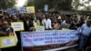 Members of West Bengal Teachers and Allied Educational Employees Federation walk in a procession protesting the demonetization of high-value bills in Kolkata, India, Wednesday, Dec. 28, 2016.
