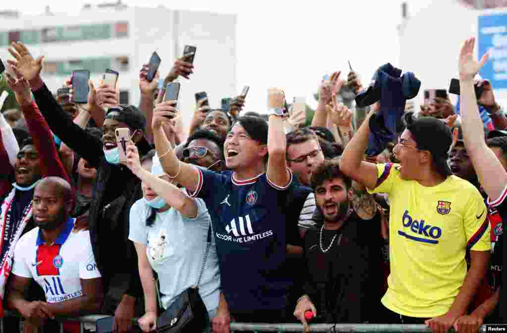 Fans await the arrival of Lionel Messi outside the Parc des Princes, France. The six-time Ballon d&#39;Or winner received a hero&#39;s welcome to join Paris Saint Germain (PSG) following his shock departure from Barcelona.