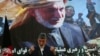  Afghan President Hamid Karzai speaks during a joint news conference with NATO Secretary General Anders Fogh Rasmussen following a security handover ceremony at a military academy outside Kabul, Afghanistan, June 18, 2013.