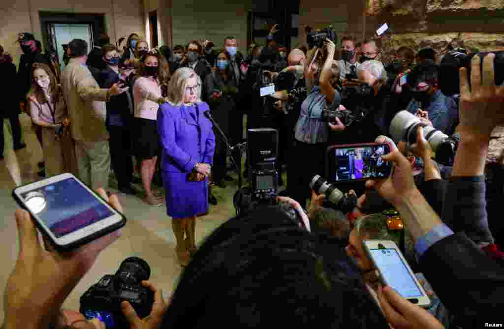 U.S. Representative Liz Cheney (R-WY) speaks to the media as she arrives on Capitol Hill in Washington. House Republicans ousted her from a leadership post over her critisim of former President Donald Trump&#39;s false claims of a stolen election.