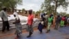 FILE: Villagers collect their monthly food ration provided by the United Nations World Food Program (WFP) in Masvingo, Zimbabwe.