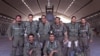 Saudi pilots pose for a group portrait after taking part in U.S.-led coalition airstrikes on Islamic State militants and other targets in Syria, Sept. 24, 2014.