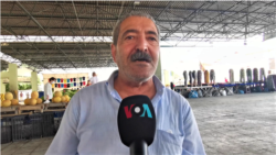 CANİP KAYA li Bazarekî Enqerê