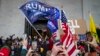 FILE - Insurrections loyal to President Donald Trump riot outside the Capitol, Jan. 6, 2021, in Washington. 