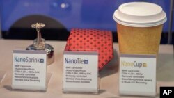 A sprinkler, tie and coffee cup with hidden cameras are featured at an expo of Israeli intelligence-gathering technology in Tel Aviv, June 30, 2015. Two dozen Israeli companies exhibited their products used by Israeli and international militaries, police units and intelligence organizations.