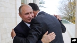 Le président russe Vladimir Poutine et le président syrien Bashar Assad à Sotchi, en Russie, le 20 novembre 2017.