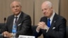 UN special envoy for Syria envoy Staffan de Mistura, right, and his deputy Ramzy Ezzeldin Ramzy attend a meeting with the Syrian government delegation during Syria peace talks at the United Nations office in Geneva, Switzerland, April 22, 2016.