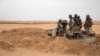 Des soldats mauritaniens à un avant-poste de la force opérationnelle G5 Sahel dans le sud-est de la Mauritanie, le long de la frontière avec le Mali, le 22 novembre 2018.