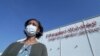 La ministre éthiopienne de la Santé, Lia Tadesse, après avoir réceptionné les vaccins AstraZeneca / Oxford dans le cadre du programme COVAX contre la maladie COVID-19 à l'aéroport international de Bole à Addis-Abeba , en Éthiopie, le 7 mars 2021. 