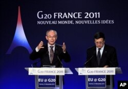 Le président du Conseil de l'Europe Herman Van Rompuy (à gauche) et le président ed la Commission européenne Manuel Barroso à Cannes