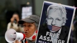 Julian Assange supporters protest outside the Old Bailey in London, Monday, Sept. 7, 2020