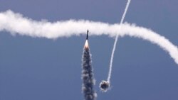 Izraelski zračni sistem Željezna kupola presreće raketu lansiranu iz pojasa Gaze, pod nadzorom palestinskog pokreta Hamas, iznad južnog izraelskog grada Ashkelona, 11. maja 2021. godine.