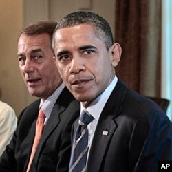 Le président Obama (à droite) et le leader républicain John Boehner