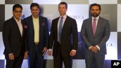 The eldest son of U.S. President Donald Trump, Donald Trump Jr. (2nd-R) poses with promoters of Trump Towers Pankaj Bansal (L), Basant Bansal of M3M developers, and Kalpesh Mehta (R) of Tribeca developers at a photocall in New Delhi, India, Feb. 20, 2018