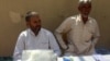 Farmer Bhim Singh (left) says farmers suffer a loss because they cannot set the price of crops but have to depend on middlemen.