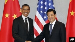 Tổng thống Obama và Chủ tịch Trung Quốc Hồ Cẩm Ðào tại Seoul, ngày 26/3/2012
