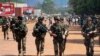 French soldiers are seen patrolling a street in Bangui on December 8, 2013. (Herve Serefio/Reuters)
