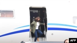 FILE - U.S. Democratic vice presidential candidate and Senator Kamala Harris gets off a plane as she arrives at Fresno Yosemite International Airport in Fresno, California, Sept. 15, 2020. 