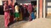 Women in Uttar Pradesh turn out enthusiastically to vote, but many cast ballots as they are instructed to by men in the family. (A. Pasricha/VOA)