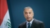 Perdana Menteri Irak Mustafa al-Kadhimi berbicara selama konferensi pers bersama di Berlin, Jerman 20 Oktober 2020. (Foto: Stefanie Loos via REUTERS)