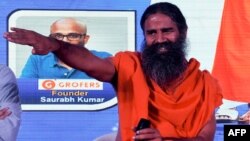 Indian guru Baba Ramdev is seen during a press conference in New Delhi, India, Jan. 16, 2018.