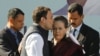 Rahul Gandhi, newly elected president of India's main opposition Congress Party, kisses the forehead of his mother and leader of the party, Sonia Gandhi, after taking charge as the president during a ceremony at the party's headquarters in New Delhi, Indi