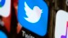 FILE - This April 26, 2017, photo shows the Twitter icon on a mobile phone in Philadelphia.