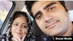 تصویری از ناهید شیرپیشه در کنار فرزندش پویا بختیاری از جان‌باختگان اعتراضات آبان ماه 