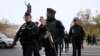 Police patrol in Place de la Republique after a series of deadly attacks the previous day in Paris, Nov. 14, 2015. 