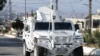 A UN peacekeepers (UNIFIL) vehicle drives in Marjayoun