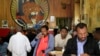 Customers drink coffee as they read newspapers at the Tamoka coffee bar in Ethiopia's capital Addis Ababa, Sept. 16, 2013. 