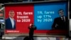 FILE - A cameraman films a campaign poster for the Labour Party candidate for mayor of London, Sadiq Khan, who became London's first Muslim mayor.