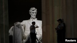 FILE - Security personnel are pictured at the Lincoln Memorial in Washington, Oct. 1, 2013.