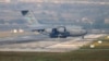 FILE - A United States Air Force cargo plane maneuvers on the runway after it landed at the Incirlik Air Base, on the outskirts of the city of Adana, southern Turkey, July 31, 2015. Pentagon orders to relocate 670 military dependents from Incirlik Air Base, Ismir, and Mugla, March 29, 2016, due to safety concerns.