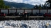 Plastic waste is seen floating on a sewage canal in the Haitian capital Port-au-Prince, on April 23, 2019.