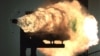 This photograph, taken from a high-speed video camera, shows a record-setting firing of an electromagnetic railgun at Naval Surface Warfare Center, Dahlgren, Virginia, Jan. 31, 2008. (Photo courtesy of U.S. Navy)