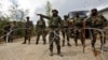 FILE - Indian army soldiers stand guard inside their army base after it was attacked by suspected separatist militants in Panzgam in Kashmir's Kupwara district, April 27, 2017. 