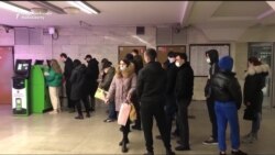 Traffic Jams and Lines for Cash as Kyiv Reacts to Russia's Attack on Ukraine