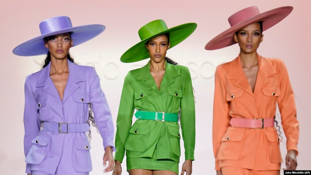 Fashion from Sergio Hudson's fall/winter 2022 collection is modeled during Fashion Week, Sunday, Feb. 13, 2022, in New York. (AP Photo/John Minchillo)